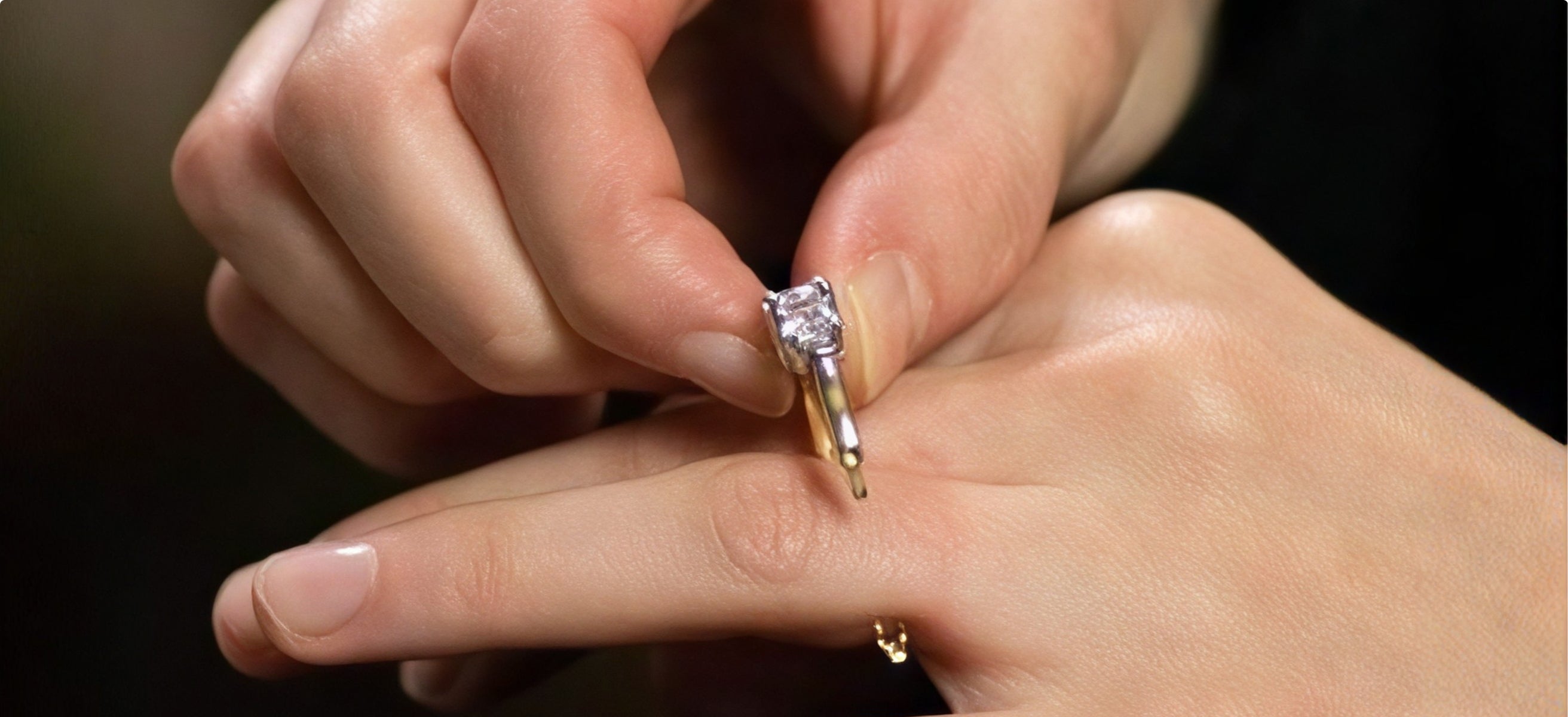 A ring being eased over a knuckle